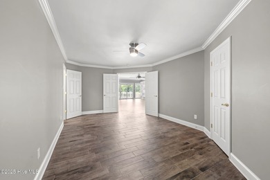 Welcome to 104 Lantern Lane: Discover this stunning home nestled on River Bend Golf and Country Club in North Carolina - for sale on GolfHomes.com, golf home, golf lot