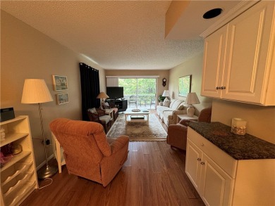 OWNER FINANCING! Active 55+ condo community with 18-27 hole golf on The American Golf Club in Florida - for sale on GolfHomes.com, golf home, golf lot