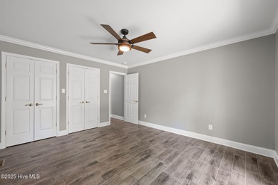 Welcome to 104 Lantern Lane: Discover this stunning home nestled on River Bend Golf and Country Club in North Carolina - for sale on GolfHomes.com, golf home, golf lot