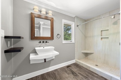 Welcome to 104 Lantern Lane: Discover this stunning home nestled on River Bend Golf and Country Club in North Carolina - for sale on GolfHomes.com, golf home, golf lot