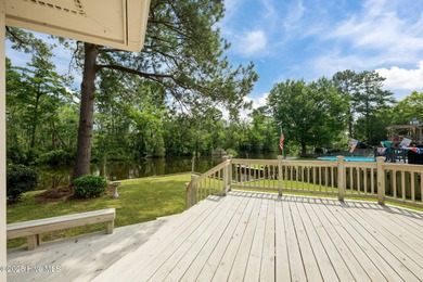 Welcome to 104 Lantern Lane: Discover this stunning home nestled on River Bend Golf and Country Club in North Carolina - for sale on GolfHomes.com, golf home, golf lot