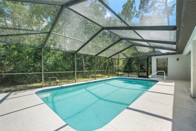 Built by Lindhorst, this warm and welcoming pool home is on Sugarmill Woods Golf and Country Club in Florida - for sale on GolfHomes.com, golf home, golf lot