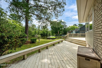 Welcome to 104 Lantern Lane: Discover this stunning home nestled on River Bend Golf and Country Club in North Carolina - for sale on GolfHomes.com, golf home, golf lot