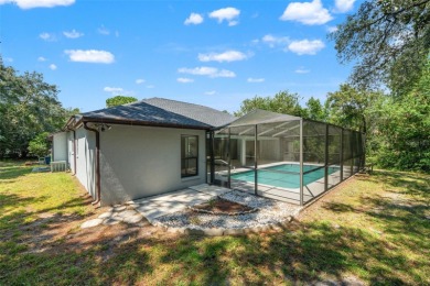 Built by Lindhorst, this warm and welcoming pool home is on Sugarmill Woods Golf and Country Club in Florida - for sale on GolfHomes.com, golf home, golf lot