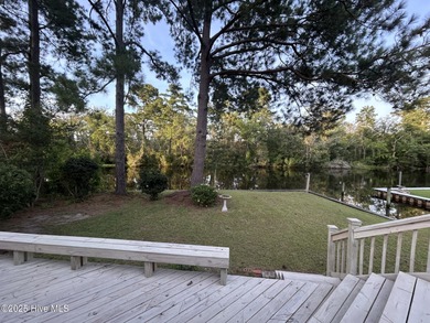 Welcome to 104 Lantern Lane: Discover this stunning home nestled on River Bend Golf and Country Club in North Carolina - for sale on GolfHomes.com, golf home, golf lot