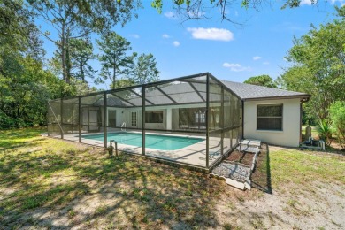 Built by Lindhorst, this warm and welcoming pool home is on Sugarmill Woods Golf and Country Club in Florida - for sale on GolfHomes.com, golf home, golf lot