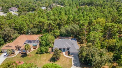 Built by Lindhorst, this warm and welcoming pool home is on Sugarmill Woods Golf and Country Club in Florida - for sale on GolfHomes.com, golf home, golf lot