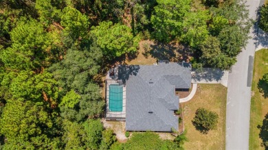 Built by Lindhorst, this warm and welcoming pool home is on Sugarmill Woods Golf and Country Club in Florida - for sale on GolfHomes.com, golf home, golf lot