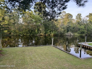 Welcome to 104 Lantern Lane:
Discover this stunning home on River Bend Golf and Country Club in North Carolina - for sale on GolfHomes.com, golf home, golf lot