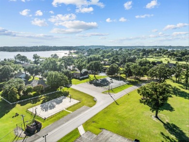 Calling all golfers and lake lovers! This beautiful large family on Emerald Bay Club in Texas - for sale on GolfHomes.com, golf home, golf lot