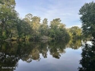 Welcome to 104 Lantern Lane:
Discover this stunning home on River Bend Golf and Country Club in North Carolina - for sale on GolfHomes.com, golf home, golf lot