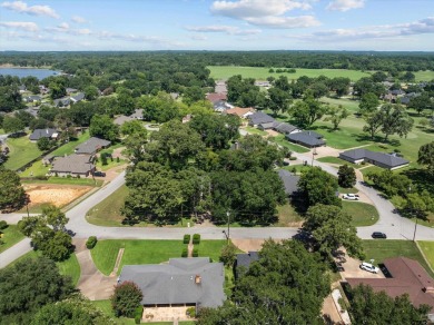 Calling all golfers and lake lovers! This beautiful large family on Emerald Bay Club in Texas - for sale on GolfHomes.com, golf home, golf lot
