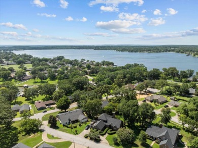 Calling all golfers and lake lovers! This beautiful large family on Emerald Bay Club in Texas - for sale on GolfHomes.com, golf home, golf lot
