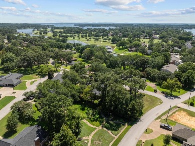 Calling all golfers and lake lovers! This beautiful large family on Emerald Bay Club in Texas - for sale on GolfHomes.com, golf home, golf lot
