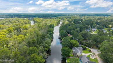 Welcome to 104 Lantern Lane:
Discover this stunning home on River Bend Golf and Country Club in North Carolina - for sale on GolfHomes.com, golf home, golf lot
