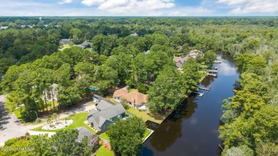 Welcome to 104 Lantern Lane:
Discover this stunning home on River Bend Golf and Country Club in North Carolina - for sale on GolfHomes.com, golf home, golf lot