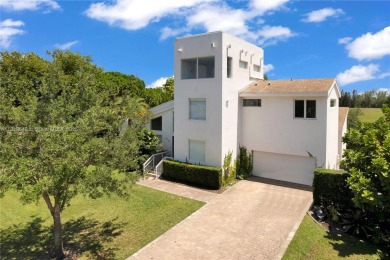 Casa Delfin is a move-in ready dream home, currently configured on Deering Bay Yacht and Country Club in Florida - for sale on GolfHomes.com, golf home, golf lot