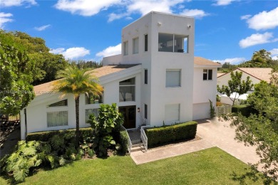 Casa Delfin is a move-in ready dream home, currently configured on Deering Bay Yacht and Country Club in Florida - for sale on GolfHomes.com, golf home, golf lot