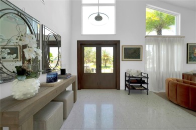 Casa Delfin is a move-in ready dream home, currently configured on Deering Bay Yacht and Country Club in Florida - for sale on GolfHomes.com, golf home, golf lot