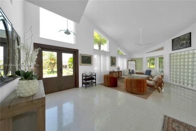 Casa Delfin is a move-in ready dream home, currently configured on Deering Bay Yacht and Country Club in Florida - for sale on GolfHomes.com, golf home, golf lot