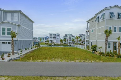 STUNNING WATERFRONT UNOBERSTRUCTED VIEW in a private waterfront on Oyster Bay Golf Links in North Carolina - for sale on GolfHomes.com, golf home, golf lot