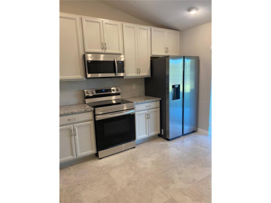 Beautiful Duplex with Freshwater Canal View. Located in Cypress on The Grand Club Cypress Course in Florida - for sale on GolfHomes.com, golf home, golf lot