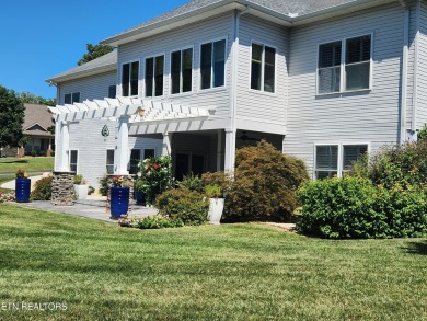 Beautifully remodeled four-bedroom home with a three-car garage on Tellico Village -The Links At Kahite Golf Course in Tennessee - for sale on GolfHomes.com, golf home, golf lot