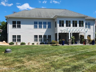 Beautifully remodeled four-bedroom home with a three-car garage on Tellico Village -The Links At Kahite Golf Course in Tennessee - for sale on GolfHomes.com, golf home, golf lot