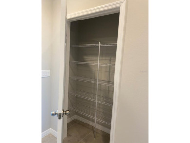 Beautiful Duplex with Freshwater Canal View. Located in Cypress on The Grand Club Cypress Course in Florida - for sale on GolfHomes.com, golf home, golf lot