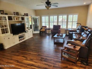 Beautifully remodeled four-bedroom home with a three-car garage on Tellico Village -The Links At Kahite Golf Course in Tennessee - for sale on GolfHomes.com, golf home, golf lot