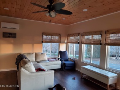 Beautifully remodeled four-bedroom home with a three-car garage on Tellico Village -The Links At Kahite Golf Course in Tennessee - for sale on GolfHomes.com, golf home, golf lot