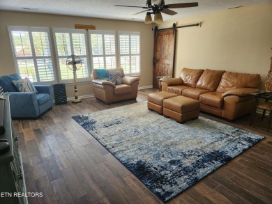 Beautifully remodeled four-bedroom home with a three-car garage on Tellico Village -The Links At Kahite Golf Course in Tennessee - for sale on GolfHomes.com, golf home, golf lot