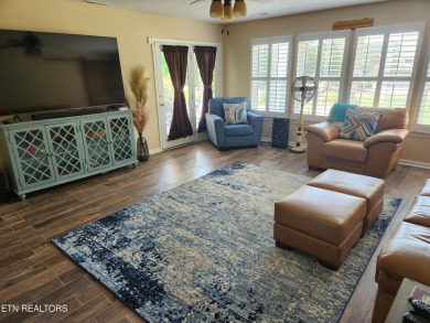 Beautifully remodeled four-bedroom home with a three-car garage on Tellico Village -The Links At Kahite Golf Course in Tennessee - for sale on GolfHomes.com, golf home, golf lot