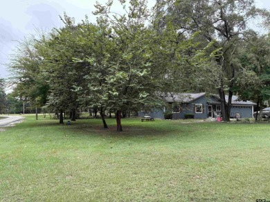 Charming Corner Lot nestled in the serene, gated community of on Holly Lake Ranch Golf Club in Texas - for sale on GolfHomes.com, golf home, golf lot