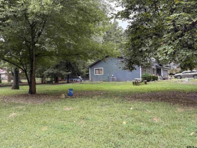 Charming Corner Lot nestled in the serene, gated community of on Holly Lake Ranch Golf Club in Texas - for sale on GolfHomes.com, golf home, golf lot