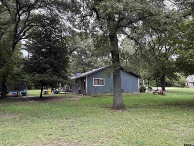 Charming Corner Lot nestled in the serene, gated community of on Holly Lake Ranch Golf Club in Texas - for sale on GolfHomes.com, golf home, golf lot