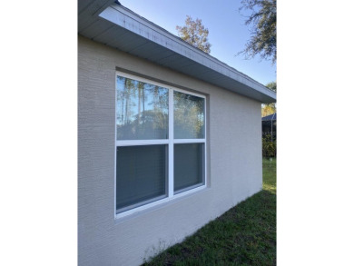 Beautiful Duplex with Freshwater Canal View. Located in Cypress on The Grand Club Cypress Course in Florida - for sale on GolfHomes.com, golf home, golf lot