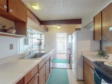 This well-loved SINGLE LEVEL home has been cared for over the on Mililani Golf Club in Hawaii - for sale on GolfHomes.com, golf home, golf lot