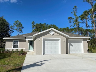 Beautiful Duplex with Freshwater Canal View. Located in Cypress on The Grand Club Cypress Course in Florida - for sale on GolfHomes.com, golf home, golf lot