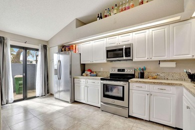 Turnkey + income-producing in sought-after Woodmont . This 3BD/2 on Woodmont Country Club in Florida - for sale on GolfHomes.com, golf home, golf lot