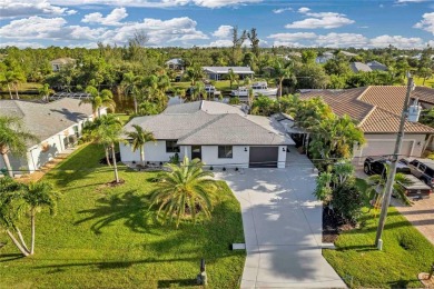 NEVER FLOODED! WOW-FACTOR WATERFRONT! Whole house luxury on Rotonda Golf and Country Club - Long Marsh  in Florida - for sale on GolfHomes.com, golf home, golf lot