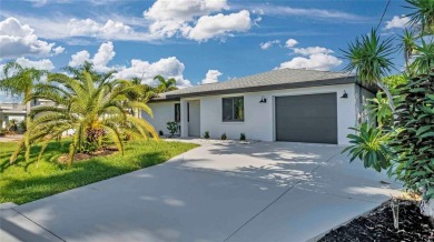 NEVER FLOODED! WOW-FACTOR WATERFRONT! Whole house luxury on Rotonda Golf and Country Club - Long Marsh  in Florida - for sale on GolfHomes.com, golf home, golf lot
