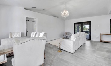 NEVER FLOODED! WOW-FACTOR WATERFRONT! Whole house luxury on Rotonda Golf and Country Club - Long Marsh  in Florida - for sale on GolfHomes.com, golf home, golf lot