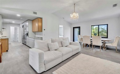 NEVER FLOODED! WOW-FACTOR WATERFRONT! Whole house luxury on Rotonda Golf and Country Club - Long Marsh  in Florida - for sale on GolfHomes.com, golf home, golf lot
