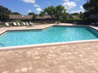 HIGHLY DESIRABLE 1ST FLOOR w/SERENE LAKE VIEWS* 2/2 HOME IN AN on Delray Beach Golf Club in Florida - for sale on GolfHomes.com, golf home, golf lot