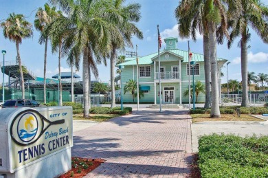 HIGHLY DESIRABLE 1ST FLOOR w/SERENE LAKE VIEWS* 2/2 HOME IN AN on Delray Beach Golf Club in Florida - for sale on GolfHomes.com, golf home, golf lot