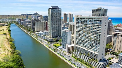 Experience the ultimate luxury in this breathtaking two-story on Ala Wai Golf Course in Hawaii - for sale on GolfHomes.com, golf home, golf lot