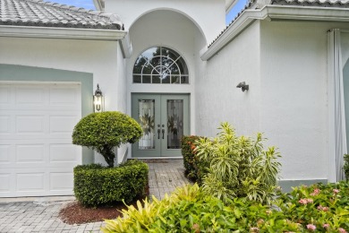 Soak in serene lake views with a backdrop of the golf course in on Santa Lucia River Club in Florida - for sale on GolfHomes.com, golf home, golf lot