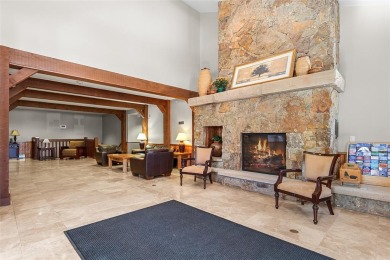 Nestled within mature Aspens and landscaped grounds, this rarely on Breckenridge Golf Club in Colorado - for sale on GolfHomes.com, golf home, golf lot