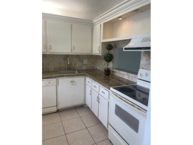 HIGHLY DESIRABLE 1ST FLOOR w/SERENE LAKE VIEWS* 2/2 HOME IN AN on Delray Beach Golf Club in Florida - for sale on GolfHomes.com, golf home, golf lot